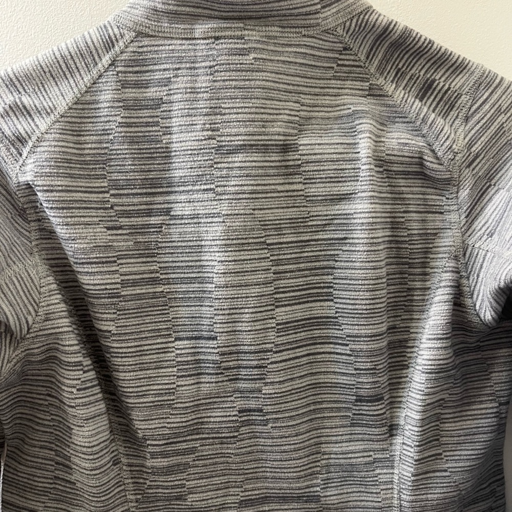 Women’s North Face grey zip up